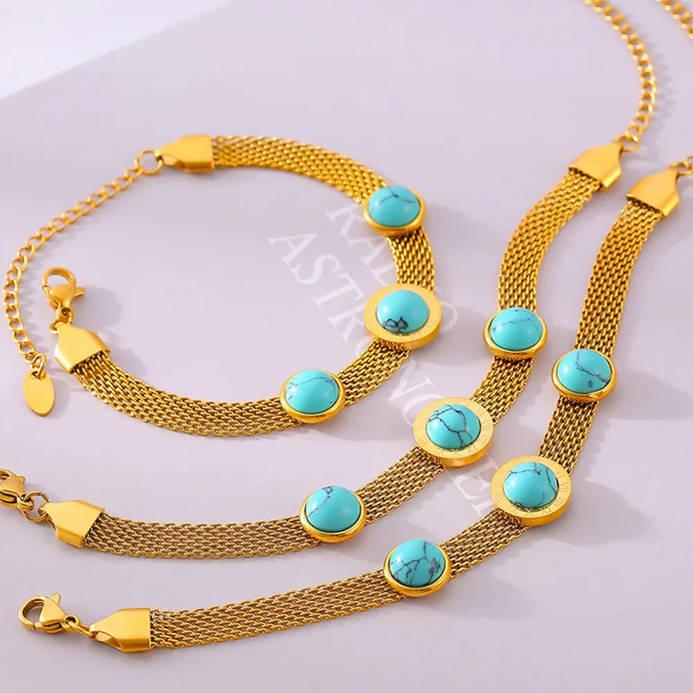 Gold mesh bracelets with turquoise stones and Roman numerals