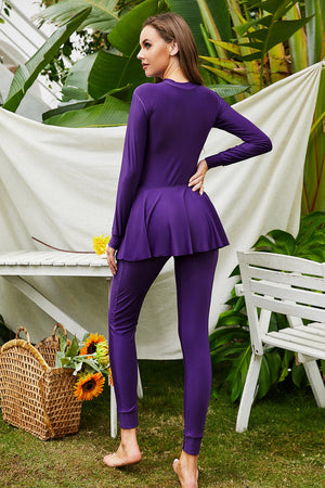 Violet long sleeve swimsuit with flounce hem and leggings
