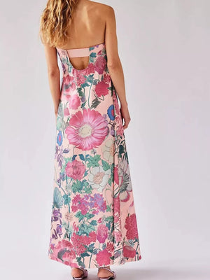 Maxi dress in pink floral print with gathered bodice and open back detail