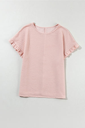 Blush pink textured top with short ruffle sleeves and a crew neck.