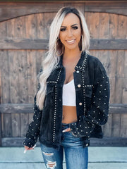 Black corduroy jacket with studded details and western-inspired design.