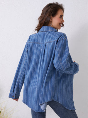 Medium denim overshirt with vertical stripes and pockets, shown from the back.
