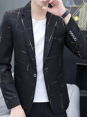 Men's black single-button slim fit blazer with a subtle gold grid pattern.