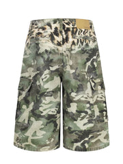 Maternity cargo capris with camouflage print and leopard print waistband.