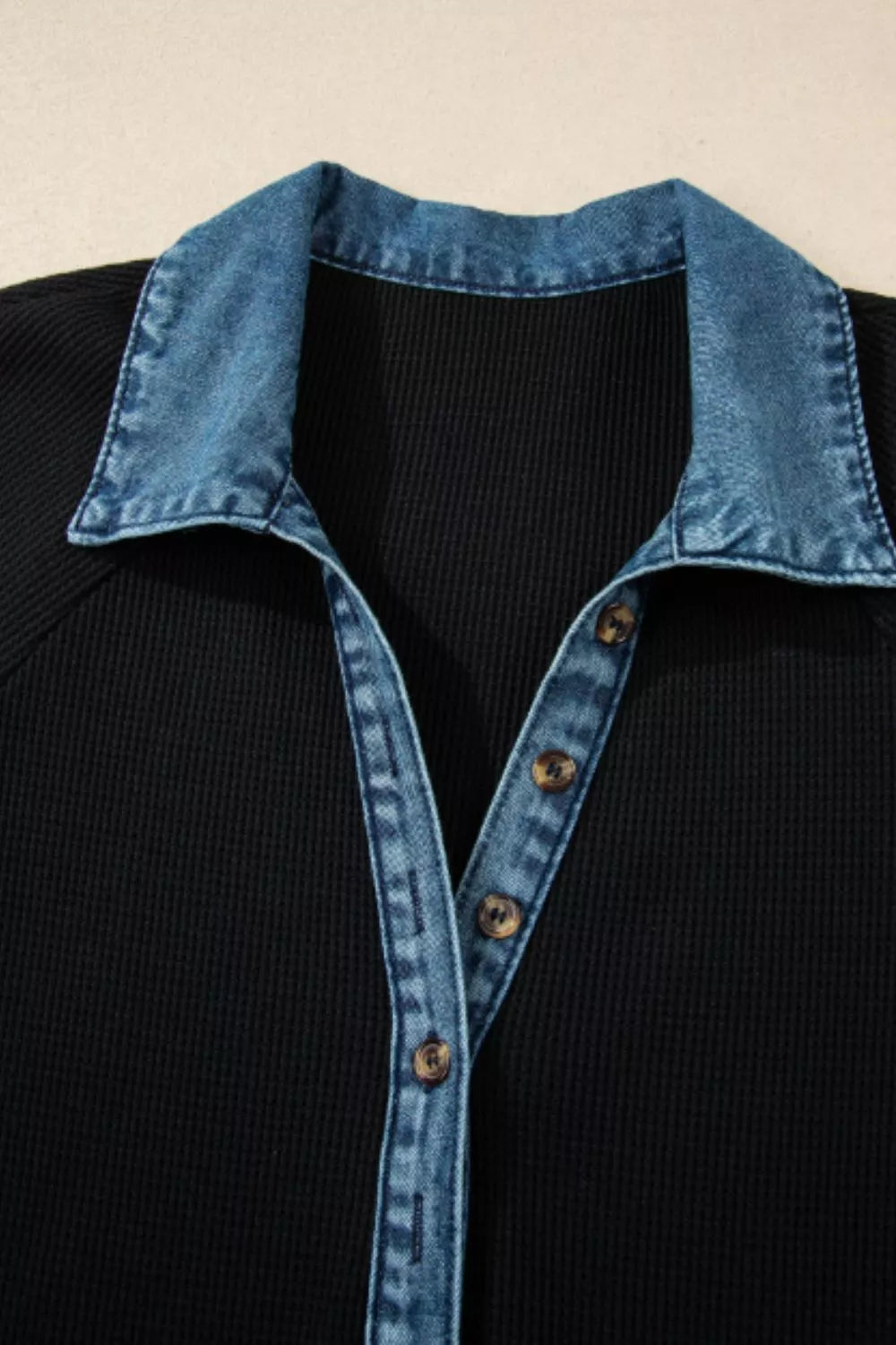 Black waffle knit mini dress with denim collar and button placket.