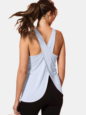 Light blue cross-back flow tank top with a relaxed fit and open back detail.