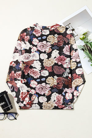 Black floral mesh second-skin top with long sleeves and a high neckline.