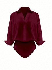 Wine red collared long sleeve bodysuit with button-down detail and cuffed sleeves
