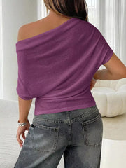 Purple ruched off-shoulder knit t-shirt with short sleeves.