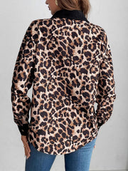 Leopard print corduroy utility shirt jacket with black collar and cuffs.