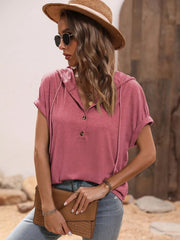 Dusty pink relaxed fit short sleeve henley hoodie with rolled cuffs and drawstring hood.