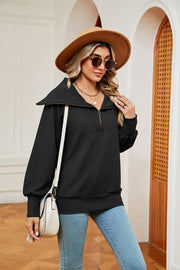 Black wide collar zip-through sweatshirt with a relaxed fit and balloon sleeves.
