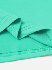 Tiffany blue t-shirt detail showing hem stitching and fabric texture