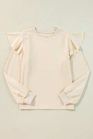Cream ruffled shoulder sweatshirt with ribbed cuffs and crew neck.