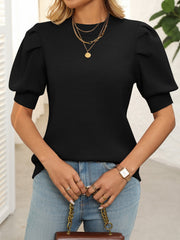 Black mock neck knit sweater with puff sleeves and ribbed texture.