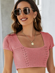 Crochet crop top in blush pink with square neckline and short sleeves.