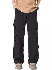 Black relaxed fit cargo sweatpants with flap pockets and button details.
