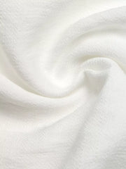 White lace detail maxi dress fabric texture close-up
