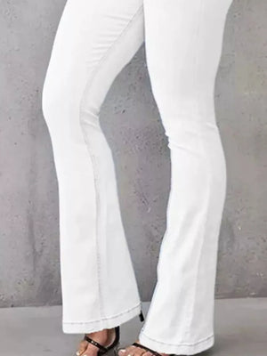 White high-waisted flare jeans with contrast stitching and a flared hem.