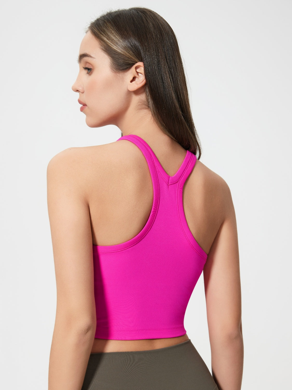 Hot Pink Sculpted Racerback Crop Tank with a smooth finish.
