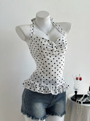 White polka dot halter cami with bow detail and ruffled hem