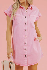 Rolled sleeve denim shirtdress in blush pink with button front and chest pockets.