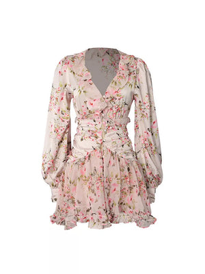 Charming ruffled floral mini dress with V-neck, button front, and long puff sleeves.
