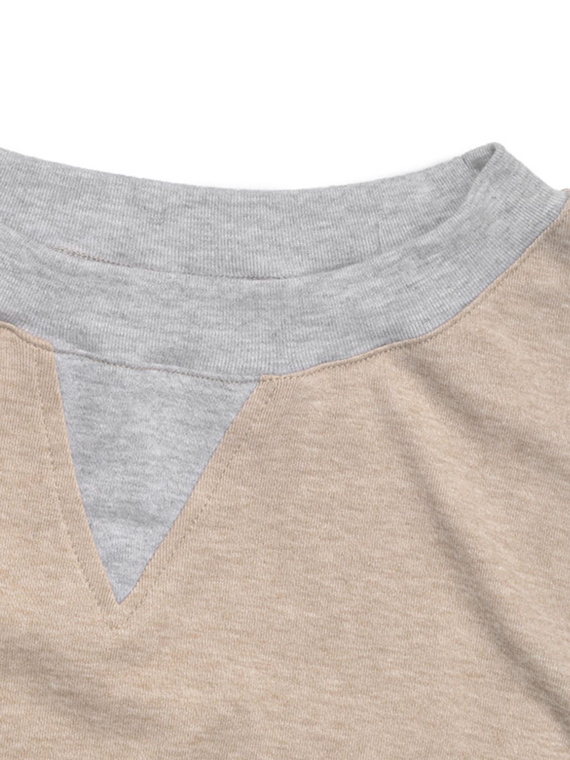Tan and grey colorblock sweatshirt with V-neck detail and crew neck trim.