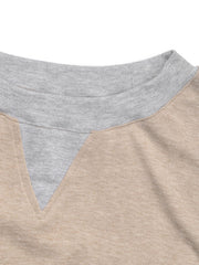 Tan and grey colorblock sweatshirt with V-neck detail and crew neck trim.