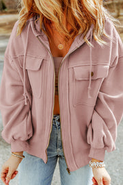 Textured utility hoodie jacket in blush pink with zip front and chest pockets.