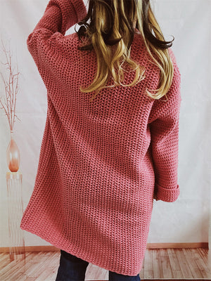 Chunky knit cocoon cardigan coat in Dusty Pink with open front and cuffed sleeves.