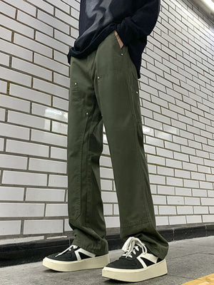 Army green relaxed fit cargo pants with utility details and silver hardware.
