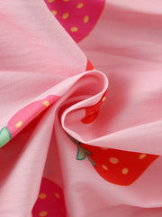 Baby dress in pink cotton blend with allover strawberry print and puff sleeve detail.