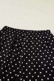 Black polka dot maternity wide-leg trousers with elastic waistband
