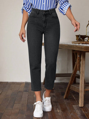 Black slim-fit ankle jeans with a modern silhouette.