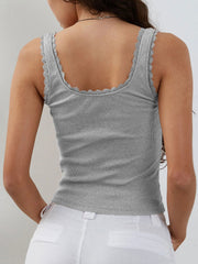Light gray ribbed knit cami with lace trim and bow detail.