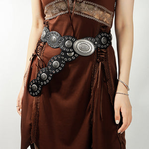 Black eyelet belt with antique silver oval buckle and studs