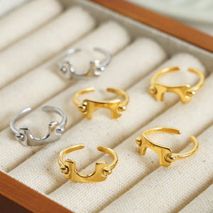 Sculptural gold open-ended ring with asymmetric detail, 18K gold-plated