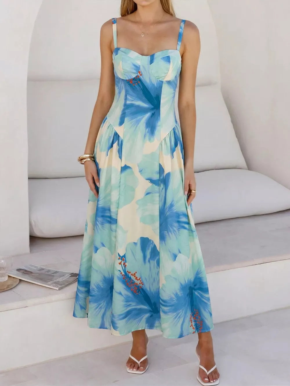 Floral sweetheart midi dress with spaghetti straps in aqua and blue.