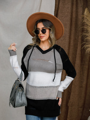 Colorblock eyelet knit hoodie with V-neck and drawstring in black, grey, and white stripes.