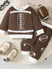 Brown baby football print top and pants set with white trim and cuffs.