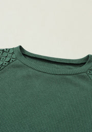 Green waffle knit raglan top with lace yoke detail