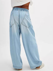 Flowy flare denim jeans in light blue with elastic waistband and wide leg