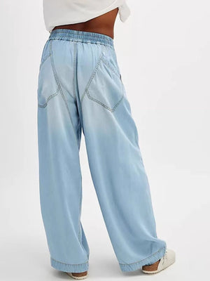 Flowy flare denim jeans in light blue with elastic waistband and wide leg