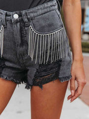 Black denim shorts with crystal fringe and distressed details