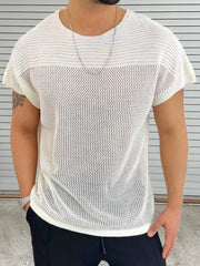 Ivory open knit boxy t-shirt with short sleeves and a crew neck.