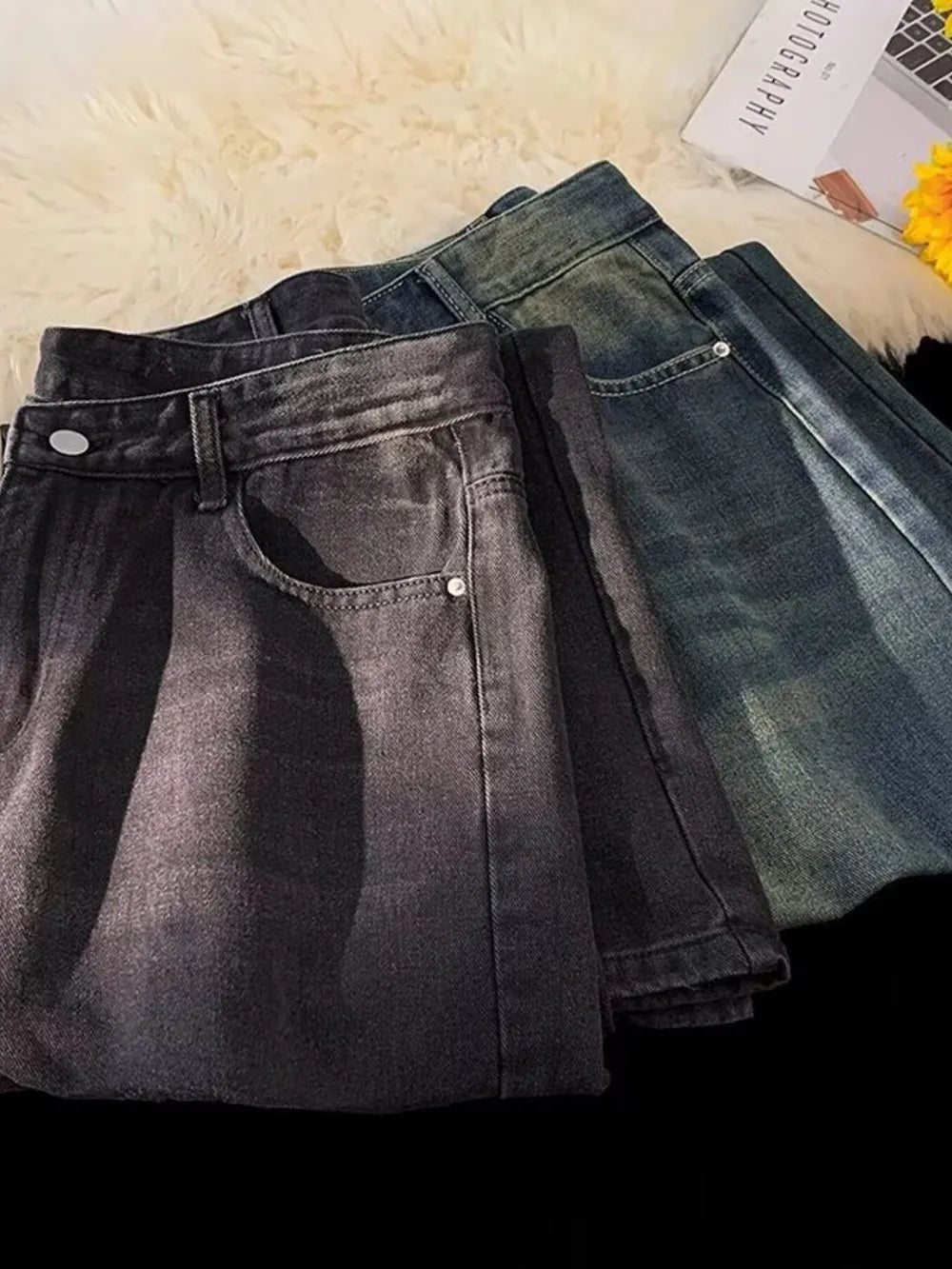 Men's plus-size wide-leg jeans in black and medium vintage wash denim.