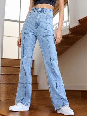 Light wash denim flare trousers with panel detailing and a high waist.