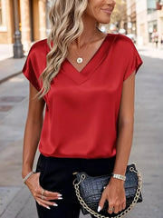 Red satin V-neck short sleeve maternity shirt with a relaxed fit.