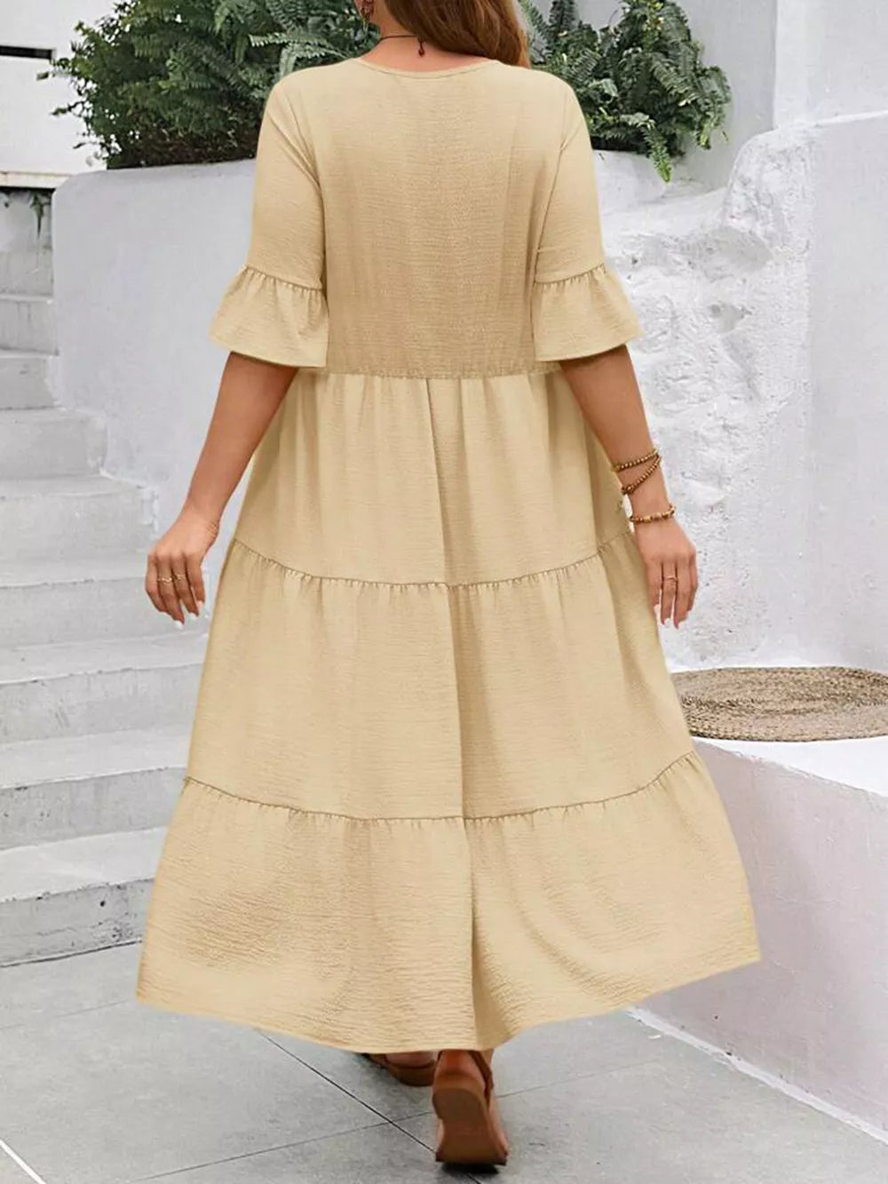 Apricot tiered midi dress with ruffle sleeves and crinkled texture